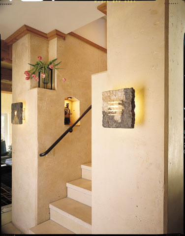 Far from the primitive earthen walls of ancient civilizations, Easton’s entry stairway is a complex configuration of nooks and niches indented in a PISE wall that have been grout-washed to resemble the look of marble.